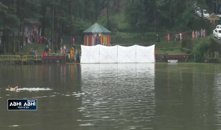 Devotees take a dip of faith in Dal Lake on Radhashtami